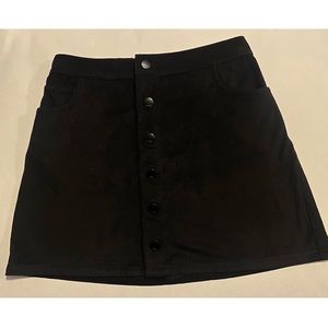New Black Express suede mini skirt with front button closure.